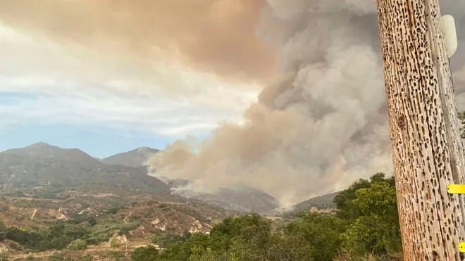 1"Breathtaking Photos Capture the Intensity of the Raging 'Airport Fire' in Orange County"